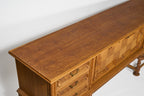 Vintage Oak Sideboard with Carved Panel and Turned Legs