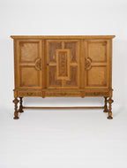 Oak Sideboard with Carved Panels and Turned Legs