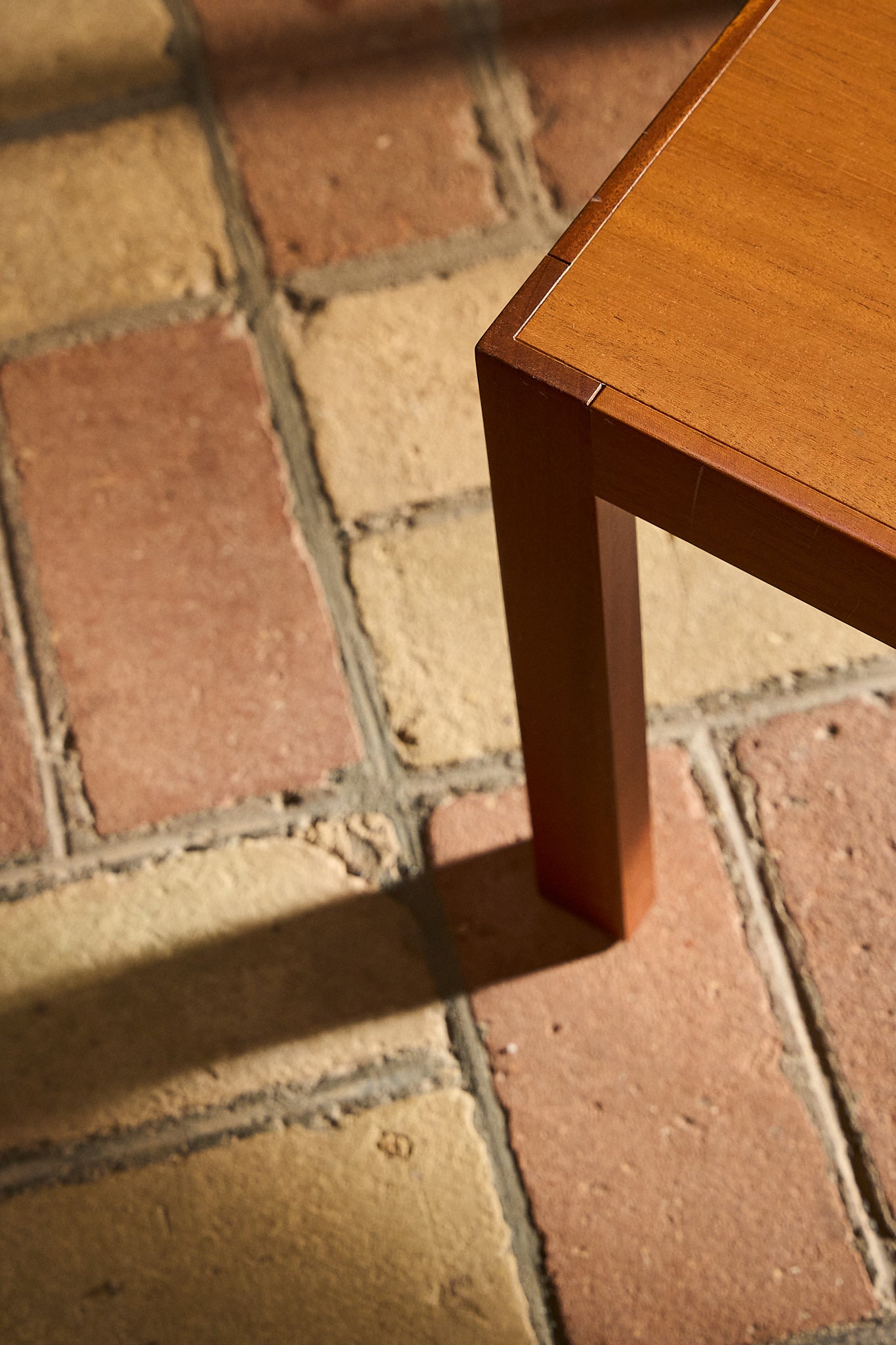 Vintage Coffee Table in Warm-Toned Wood with Minimalist Frame