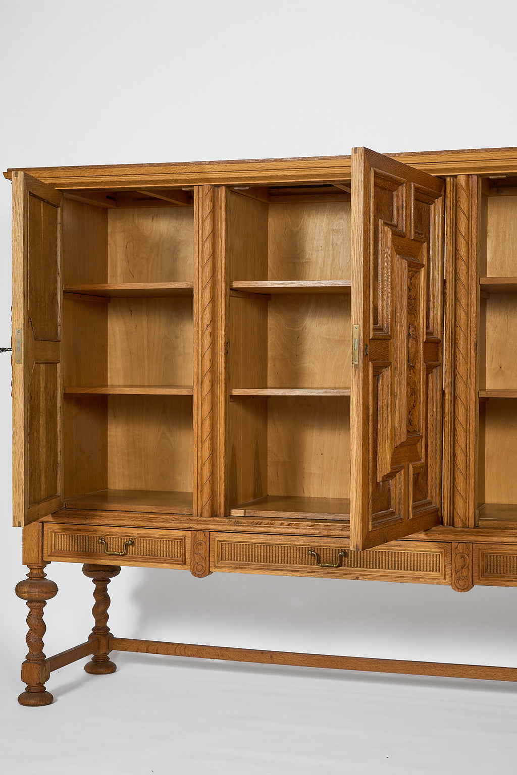 Oak Sideboard with Carved Panels and Turned Legs