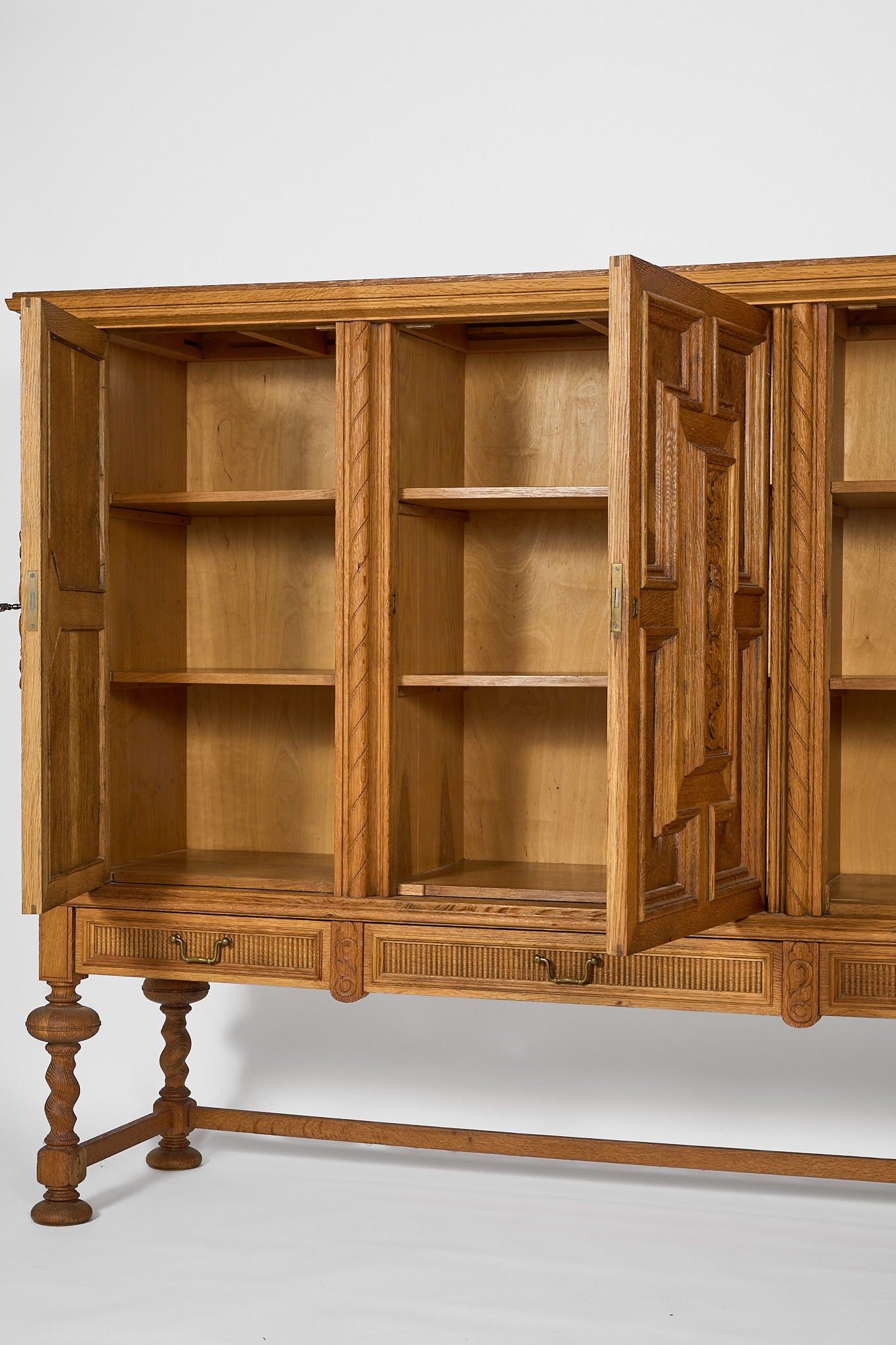 Oak Sideboard with Carved Panels and Turned Legs