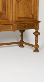 Oak Sideboard with Carved Panels and Turned Legs