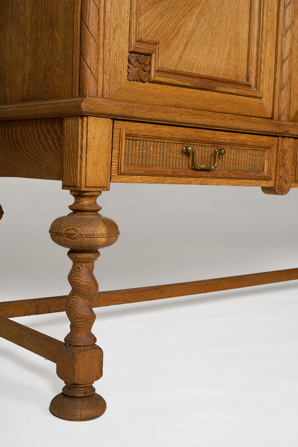 Oak Sideboard with Carved Panels and Turned Legs