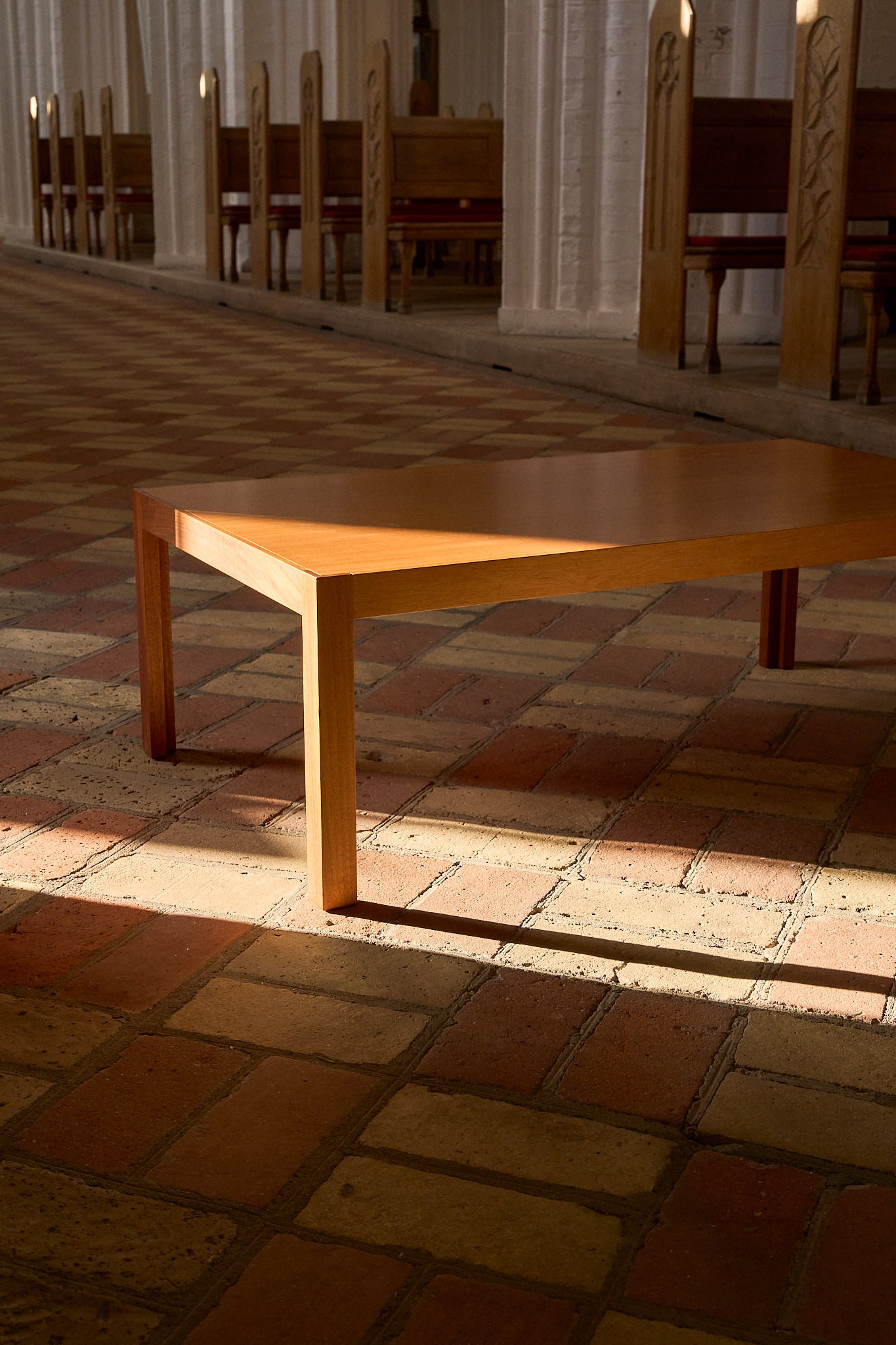 Vintage Coffee Table in Warm-Toned Wood with Minimalist Frame