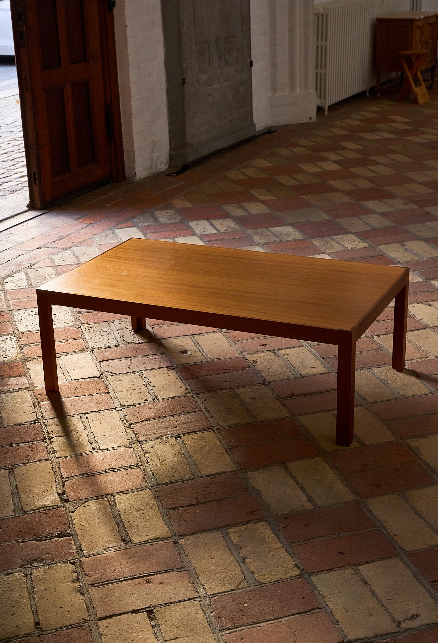 Vintage Coffee Table in Warm-Toned Wood with Minimalist Frame